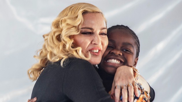 Madonna and daughter Mercy in 2017; AMOS GUMULIRA/AFP via Getty Images