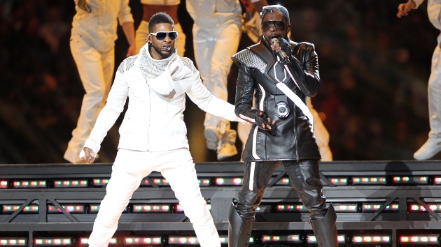 Usher during the Black Eyed Peas' halftime show in 2011; Christopher Polk/Getty Images