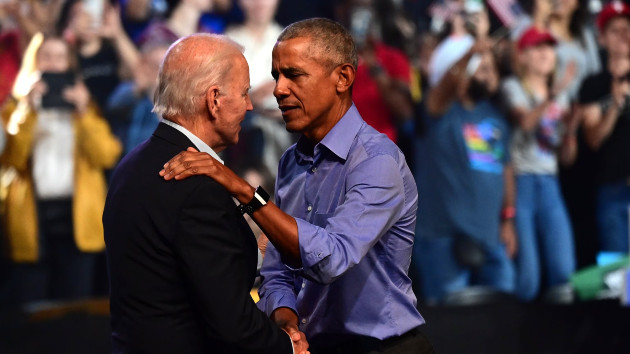 In this Nov. 5, 2022, file photo, President Joe Biden and former President Barack Obama embrace on stage during a rally in Philadelphia. (Mark Makela/Getty Images)