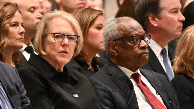 In this Dec. 19, 2023, file photo, Supreme Court justice Clarence Thomas and his wife Ginni Thomas attend a memorial service for former U.S. Supreme Court Justice Sandra Day O'Connor at the National Cathedral in Washington, D.C. (Mandel Ngan/AFP via Getty Images)