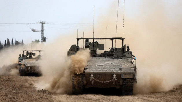 Israel tanks roll along the border with the Gaza Strip, Feb. 23, 2024, amid ongoing battles between Israel and the Palestinian militant group Hamas. (Jack Guez/AFP via Getty Images)