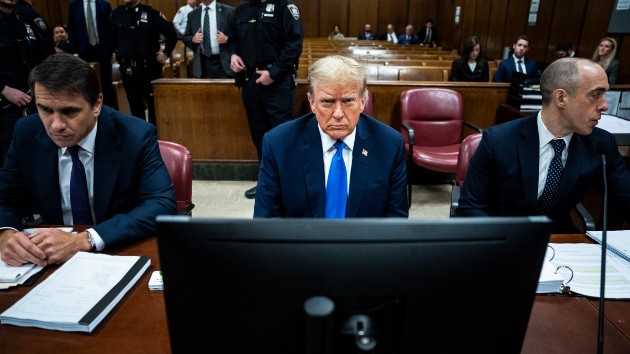 Former President Donald Trump, flanked by attorneys Todd Blanche and Emil Bove, arrives at Manhattan criminal court with his legal team as jury selection continues in New York, NY on Thursday, April 18, 2024. (Jabin Botsford/The Washington Post via Getty Images)
