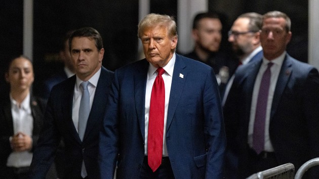 Former U.S. President Donald Trump, center, and Todd Blanche, attorney for former U.S. President Donald Trump, second left, at Manhattan criminal court in New York, U.S., on Thursday, April 25, 2024. (Jeenah Moon/Bloomberg via Getty Images)