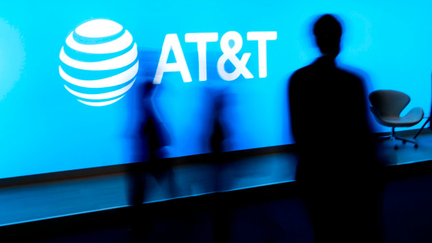 Attendants passing by AT&T's stand are seen during day 1 of Mobile World Congress 2023 at Fira Barcelona on February 27, 2023 in Barcelona, Spain. (Photo by Joan Cros Garcia - Corbis/Getty Images)