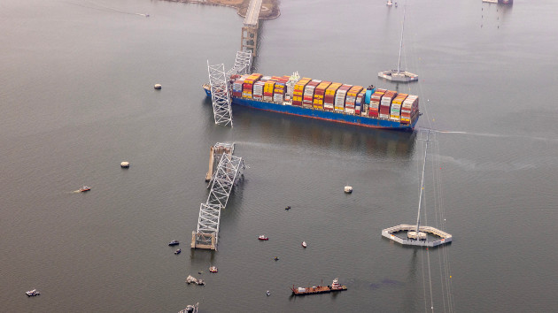 In an aerial view, cargo ship Dali is seen after running into and collapsing the Francis Scott Key Bridge on March 26, 2024 in Baltimore, Maryland. (Photo by Tasos Katopodis/Getty Images)