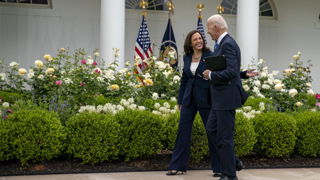 President Joe Biden, right, and U.S. Vice President Kamala Harris depart after speaking in the Rose Garden of the White House in Washington, D.C., May 13, 2021. (Tasos Katopodis/Bloomberg via Getty Images)