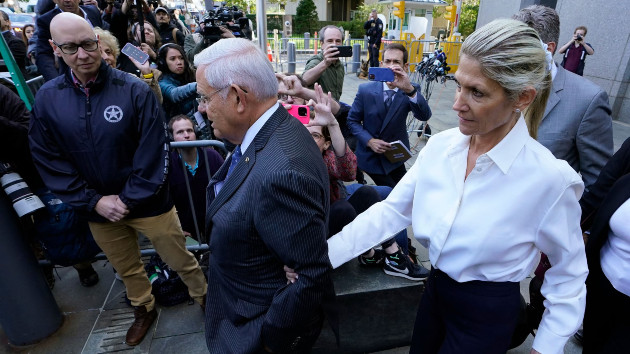 Sen. Bob Menendez, Democrat of New Jersey, with his wife Nadine Arslanian, leaves US District Court, Southern District of New York, in New York City on Sept. 27, 2023, after their arraignment. (Timothy A. Clary/AFP via Getty Images)