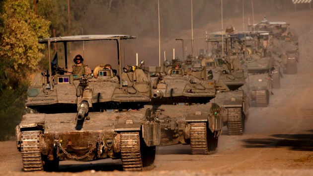 Israeli tanks move along the border with the Gaza Strip before entering into the Gaza Strip, Apr. 10, 2024, in Southern Israel. (Amir Levy/Getty Images)