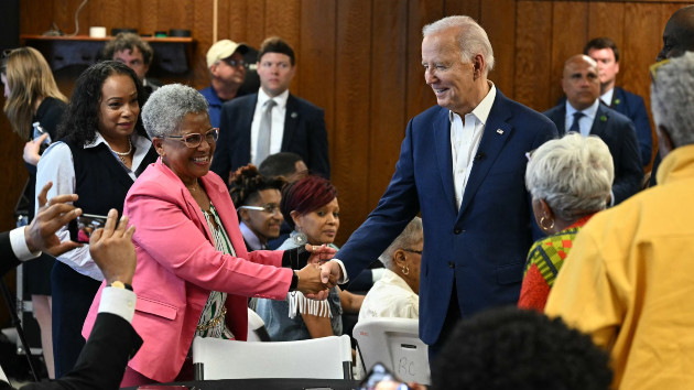 President Joe Biden greets a supporter as he meets with campaign volunteers at Dr. John Bryant Community Center in Racine, Wisconsin, on May 8, 2024. (Mandel Ngan/AFP via Getty Images)
