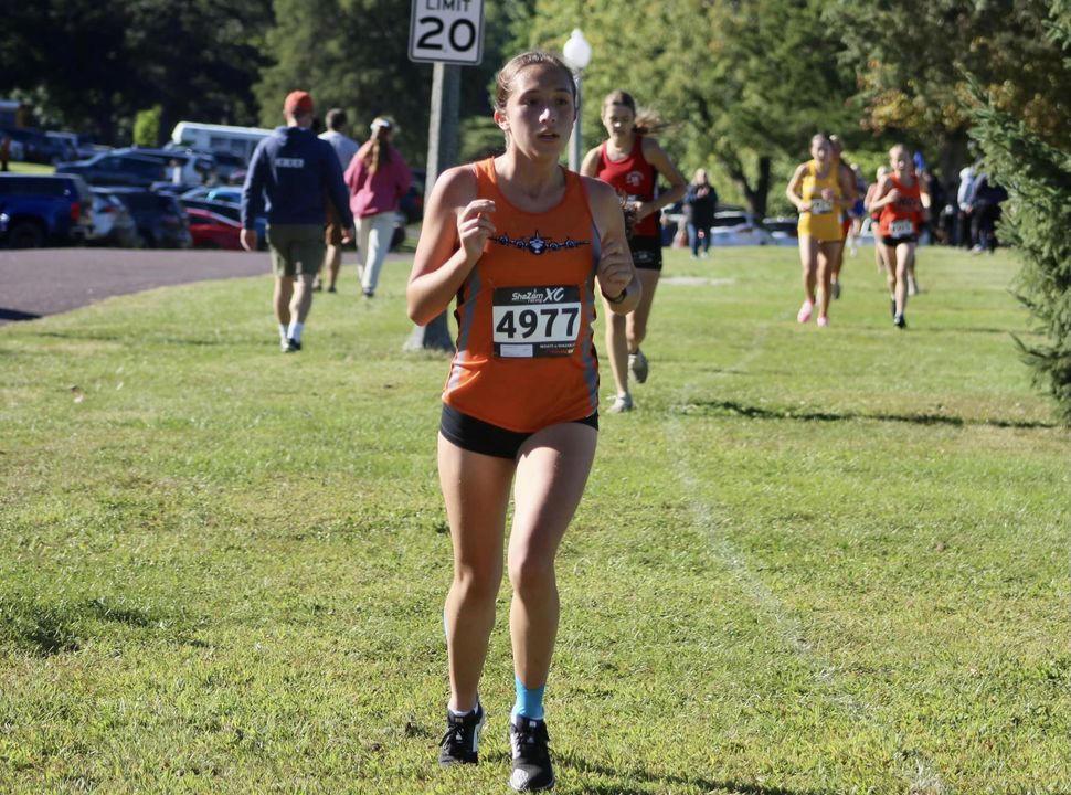 Lorna Brown with a great day today to lead the Lady Bombers at the First to the Finish meet in Peoria.  And, Kyler Glaue…
