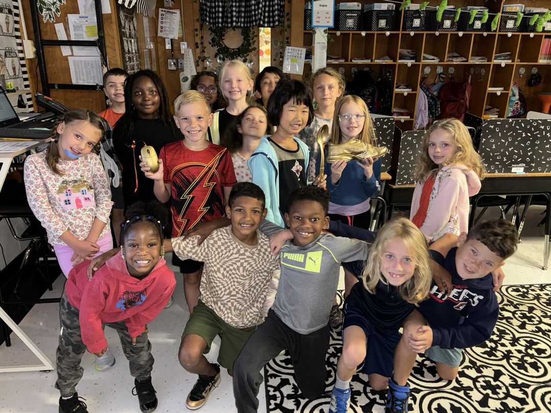 Mrs. Coupland’s 2nd graders were proud to earn the golden shoe for good behaviors in P.E. with Mr. Hickenbottom, the gol…