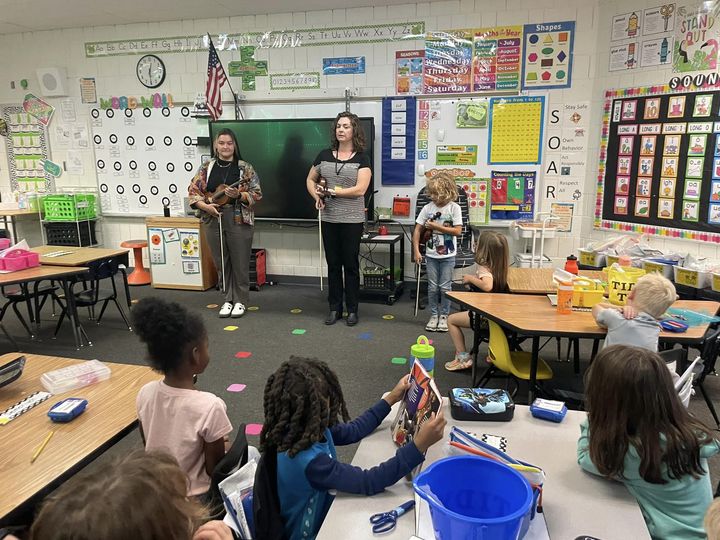 Dr. Gardner and Renee Fortino from the WIU Community Music School visited Mrs. Scott’s 1st grade class today. They learn…