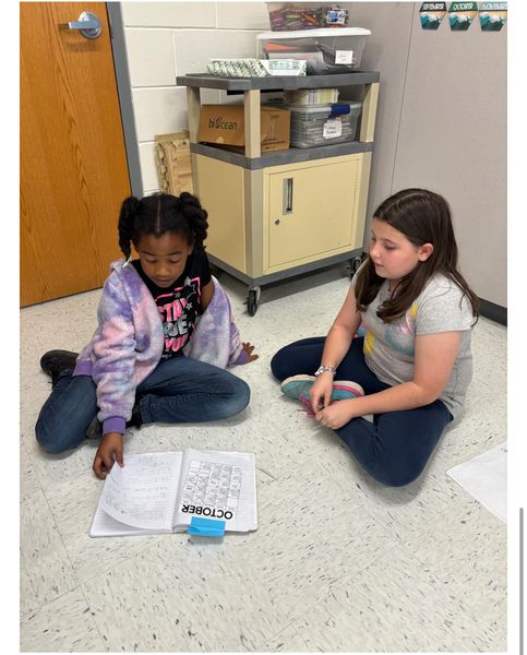 Today, Ms. Forman and Mrs. Poores class had buddy reading. 3rd grade shared their calendar writing about describing can…