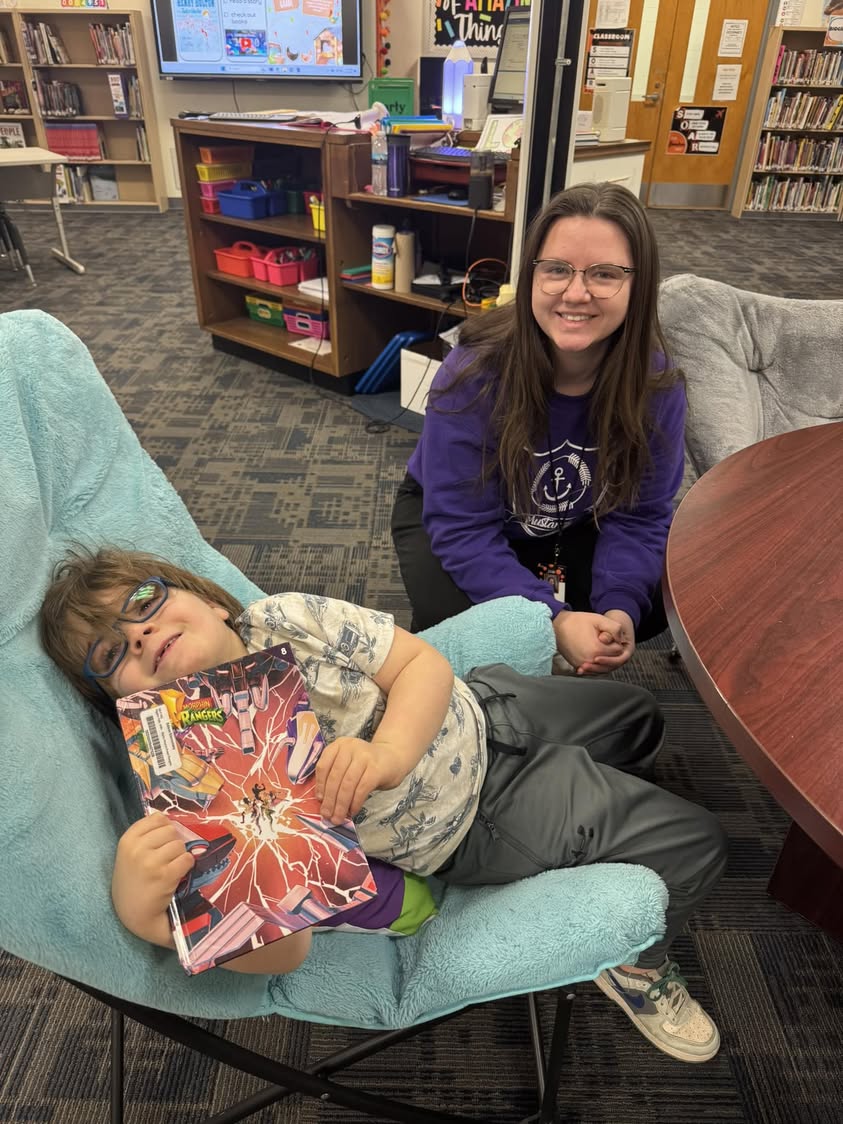 Library is one of their favorite days at Edison! Miss. Rhoads loves reading to the kids #MAC185 #edisonbombers