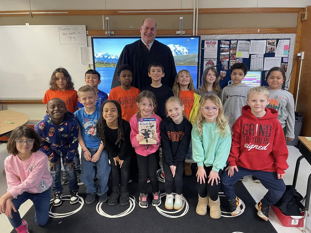 Judge Bill Rasmussen came to read to Mrs. Baxter’s class today for Lincoln’s Birthday.   They learned about Lincoln’s  a…