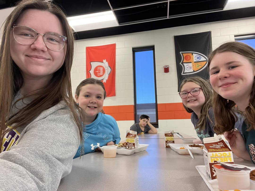 Miss Rhoads enjoying lunch with some students. #MAC185 #wedoitforthekids #lunchtime