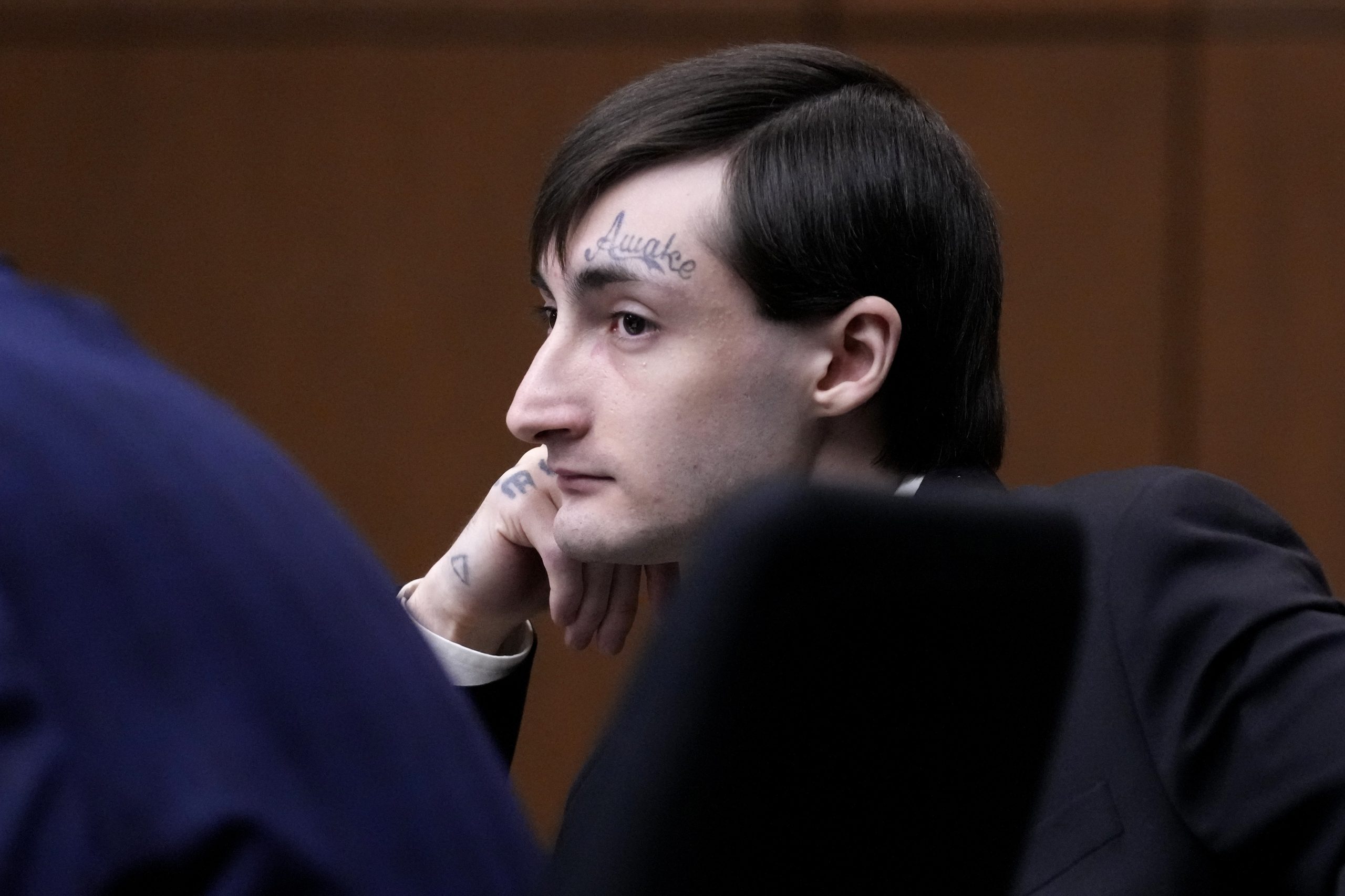 Illinois man accused of deadly mass shooting at July 4th parade faces trial 3 years after attack