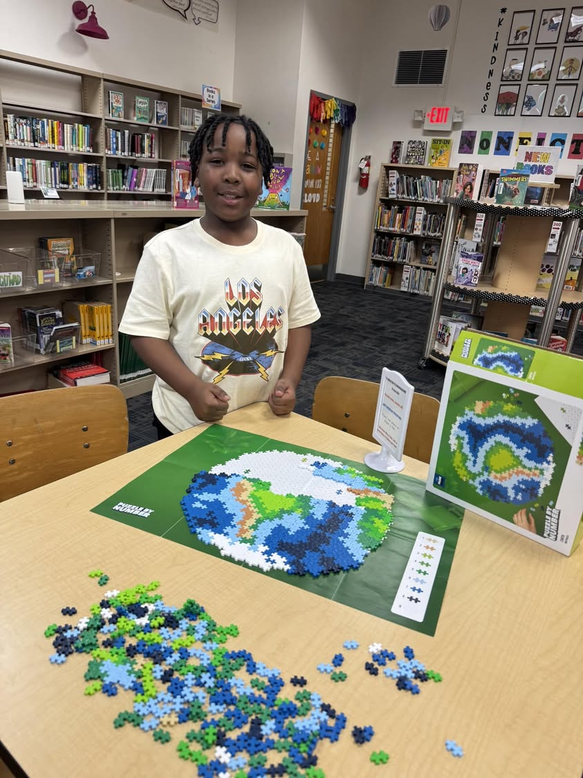 The puzzle table is a fun way to relax in the library. The kids love it. #MAC185 #edison
