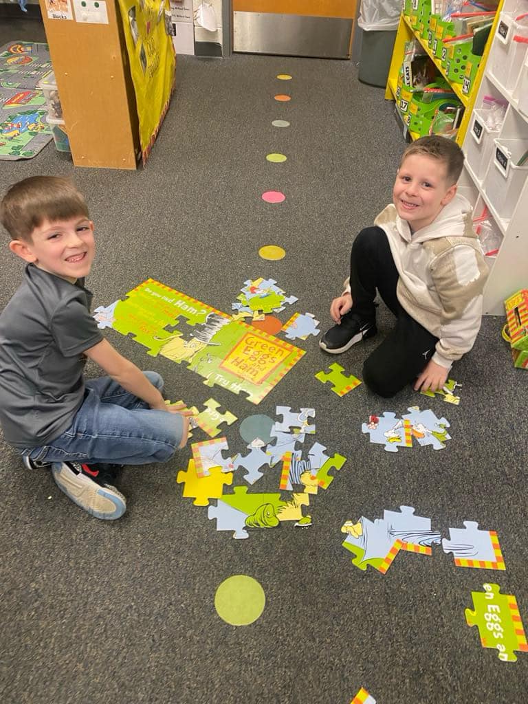Mrs. Burnham’s kindergarten students are celebrating Dr. Seuss Week by working together to put together floor puzzles. #…