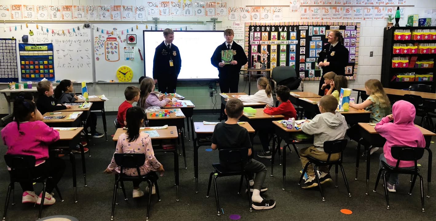 Koben Tate (president), Jefferey Lee (vice president) and Maysn Riggins (reporter) from the IL Association FFA Section 1…