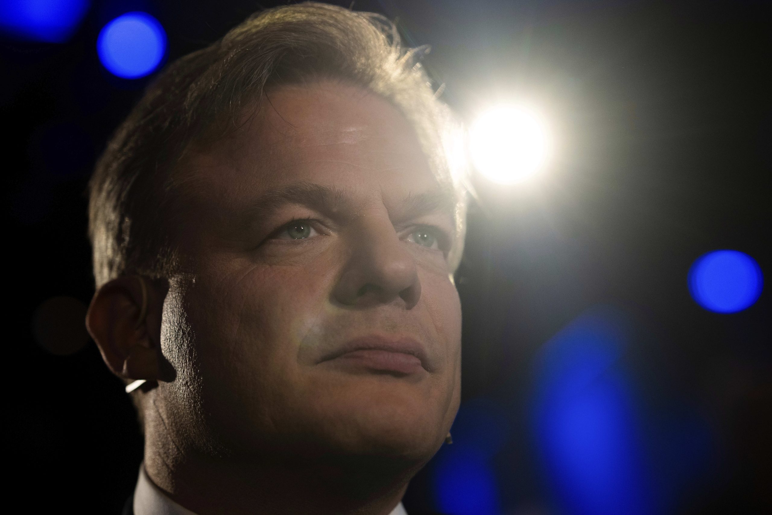 Dutch leader of party in fragile ruling coalition quits politics, citing burnout