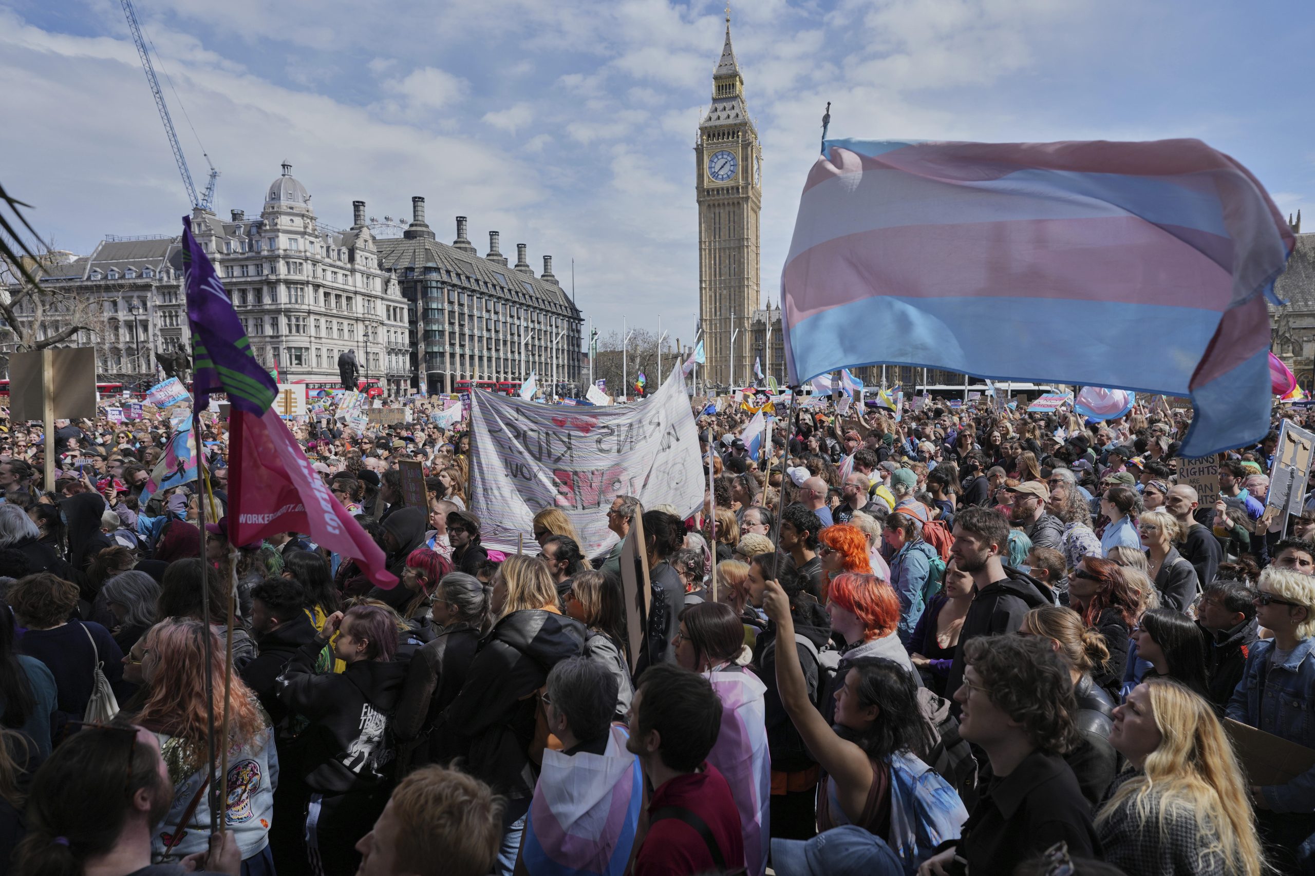 Thousands gather in London to support trans rights following UK ruling over definition of woman