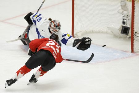 Ice hockey-Champions Canada rout Finland to set up world final with US