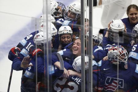 Ice hockey-US beat Canada to win world championships with Janecke overtime goal