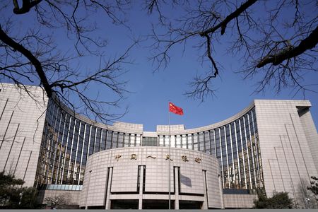 China central bank urges state-owned businesses to prioritise yuan in overseas expansion