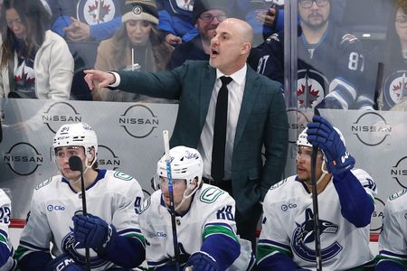 Canucks decline option, offer new deal to coach Rick Tocchet