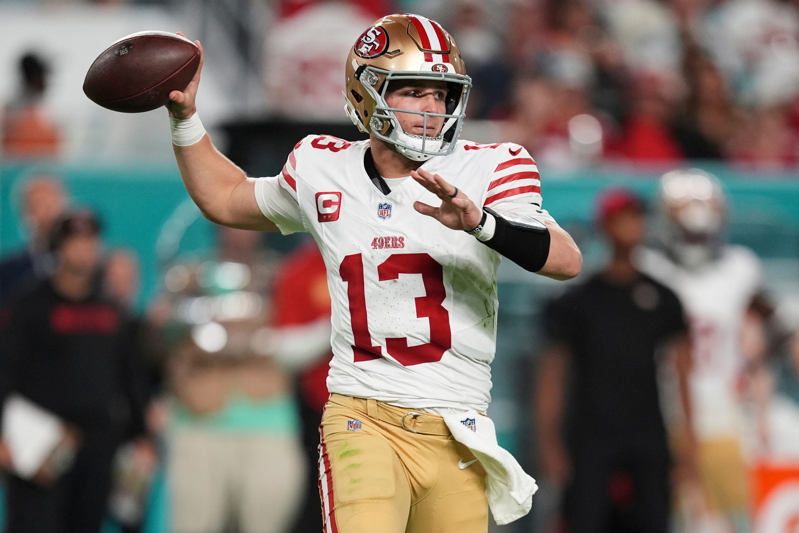 Brock Purdy reports to 49ers and George Kittle stays away from offseason program, AP source says