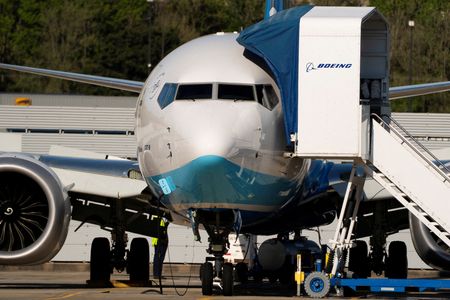 Boeing posts smaller quarterly loss on higher jet deliveries