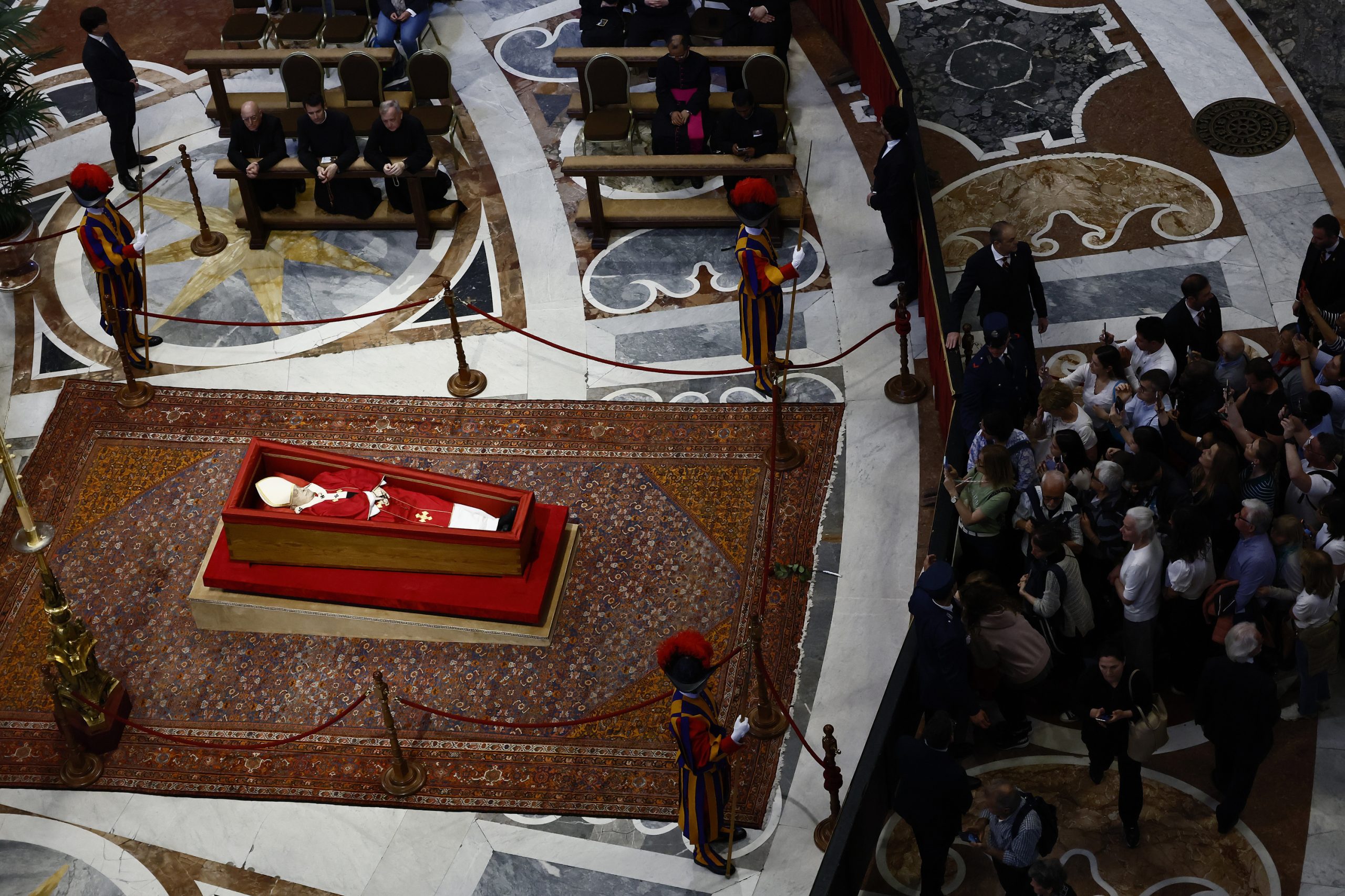 Thousands pay final respects to Pope Francis as Vatican considers extending public viewing