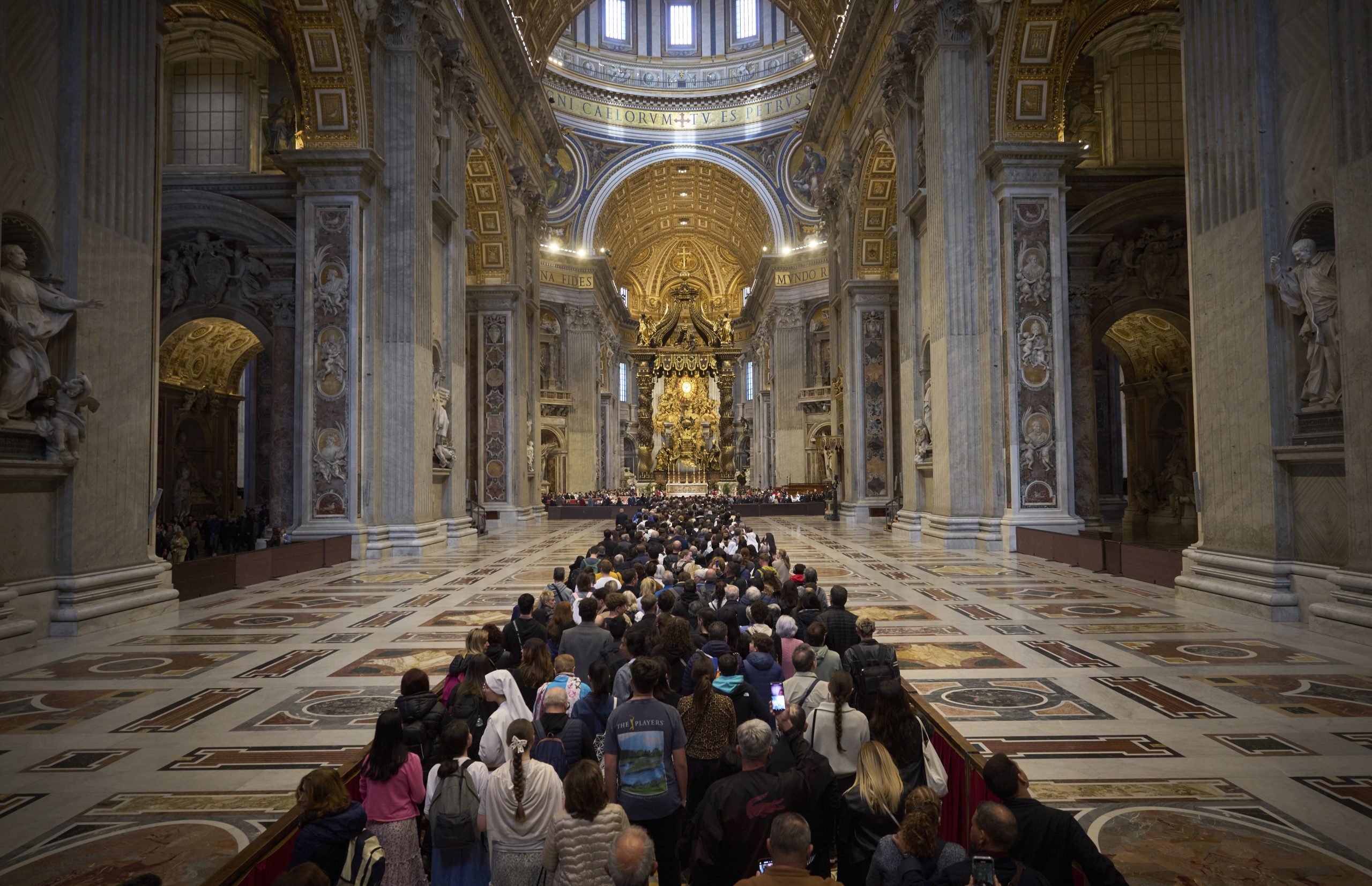 AP PHOTOS: Faithful join the line to pay their final respects to Pope Francis