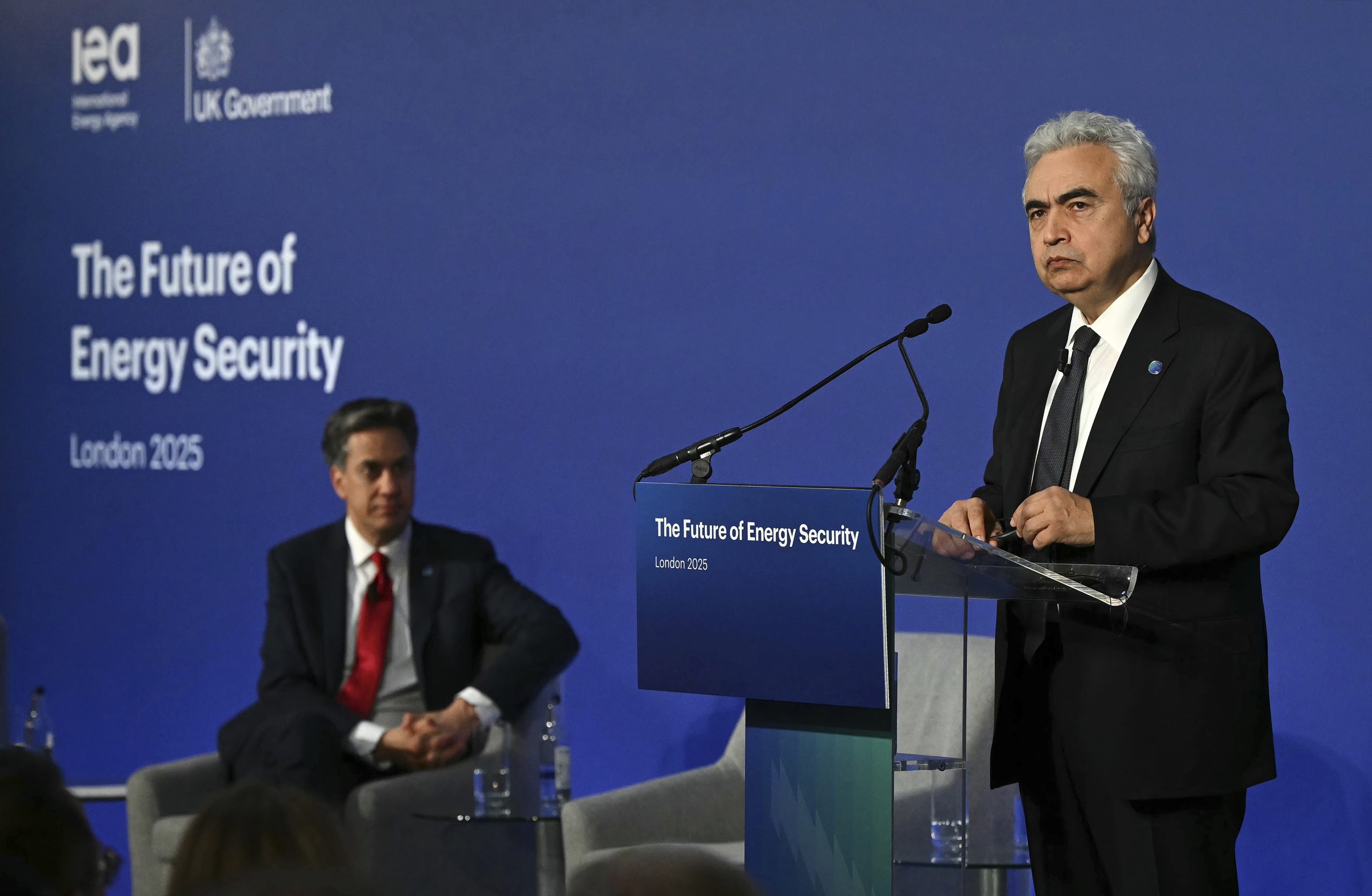 The UK says at an energy summit that green power will boost security, as the US differs