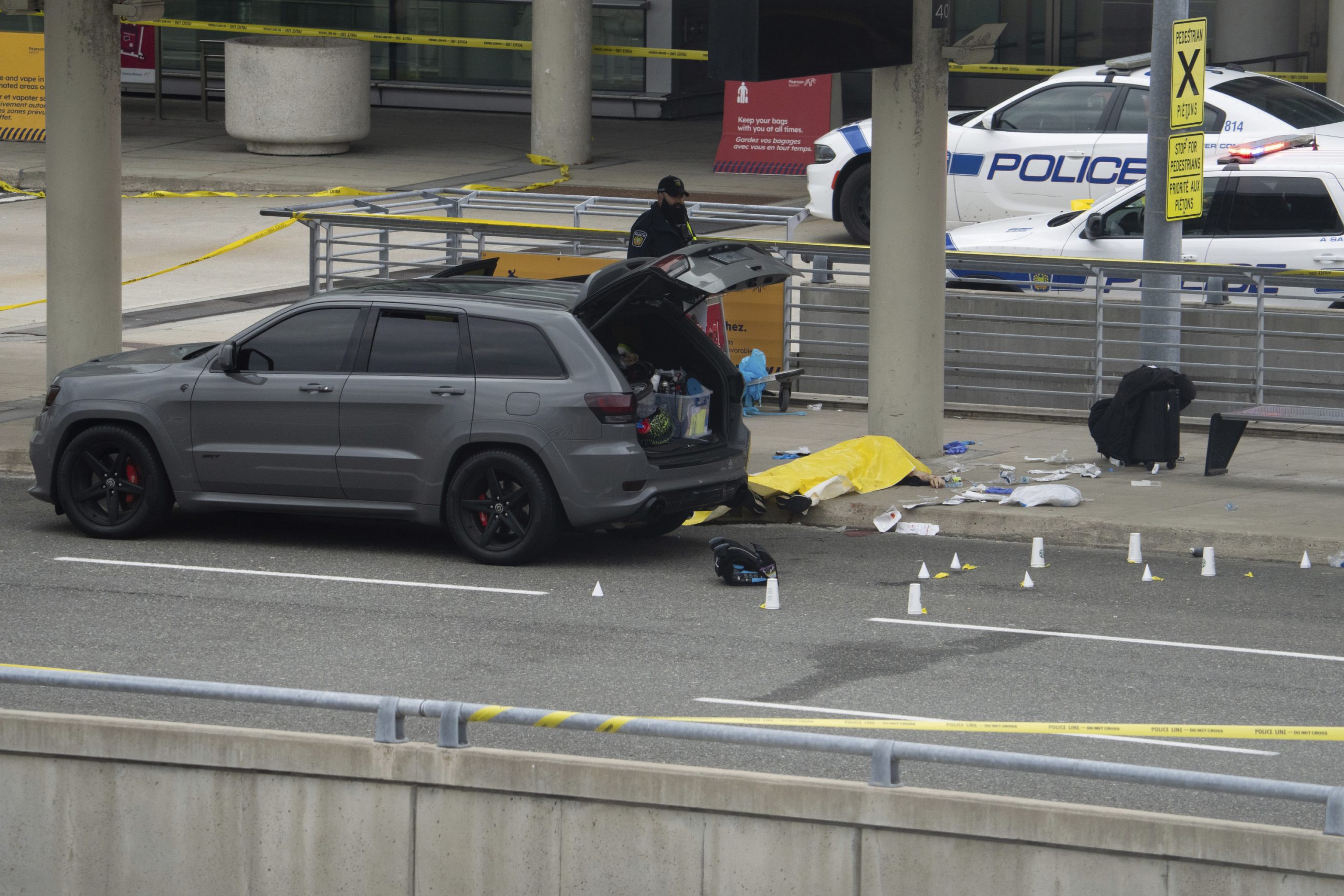 Police shooting outside terminal of Toronto’s main airport cuts off morning traffic
