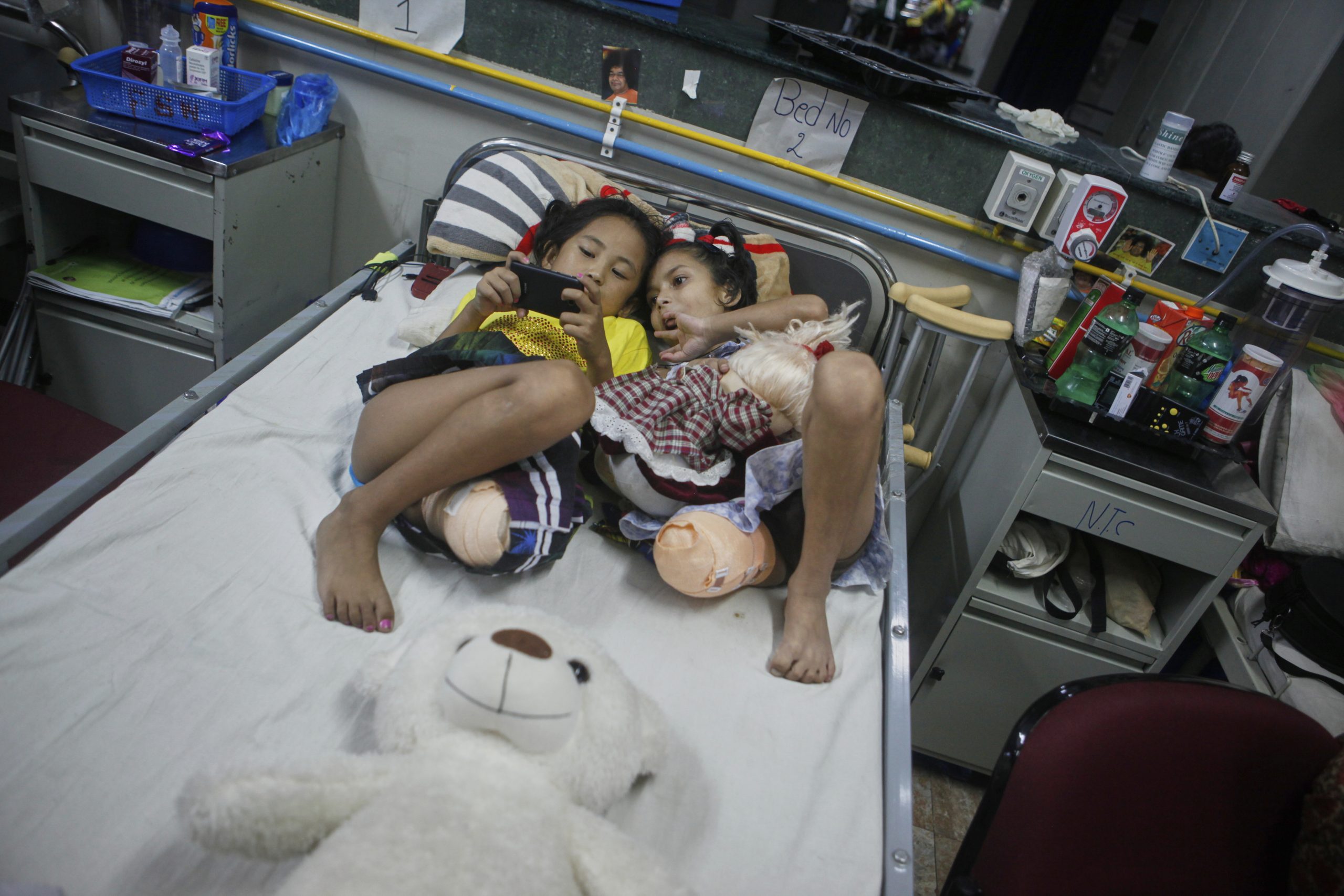 PHOTO ESSAY: 2 girls survived Nepal’s 2015 earthquake. Each lost a leg but found a friendship