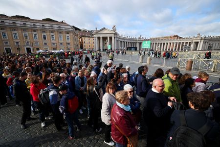Faithful flock to St. Peter’s on last day to pay respects to pope