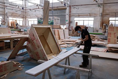 China’s factory activity slows as US tariffs hit export orders