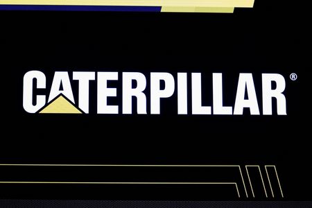 Caterpillar’s profit drops on weak demand, warns of annual sales hit from tariff