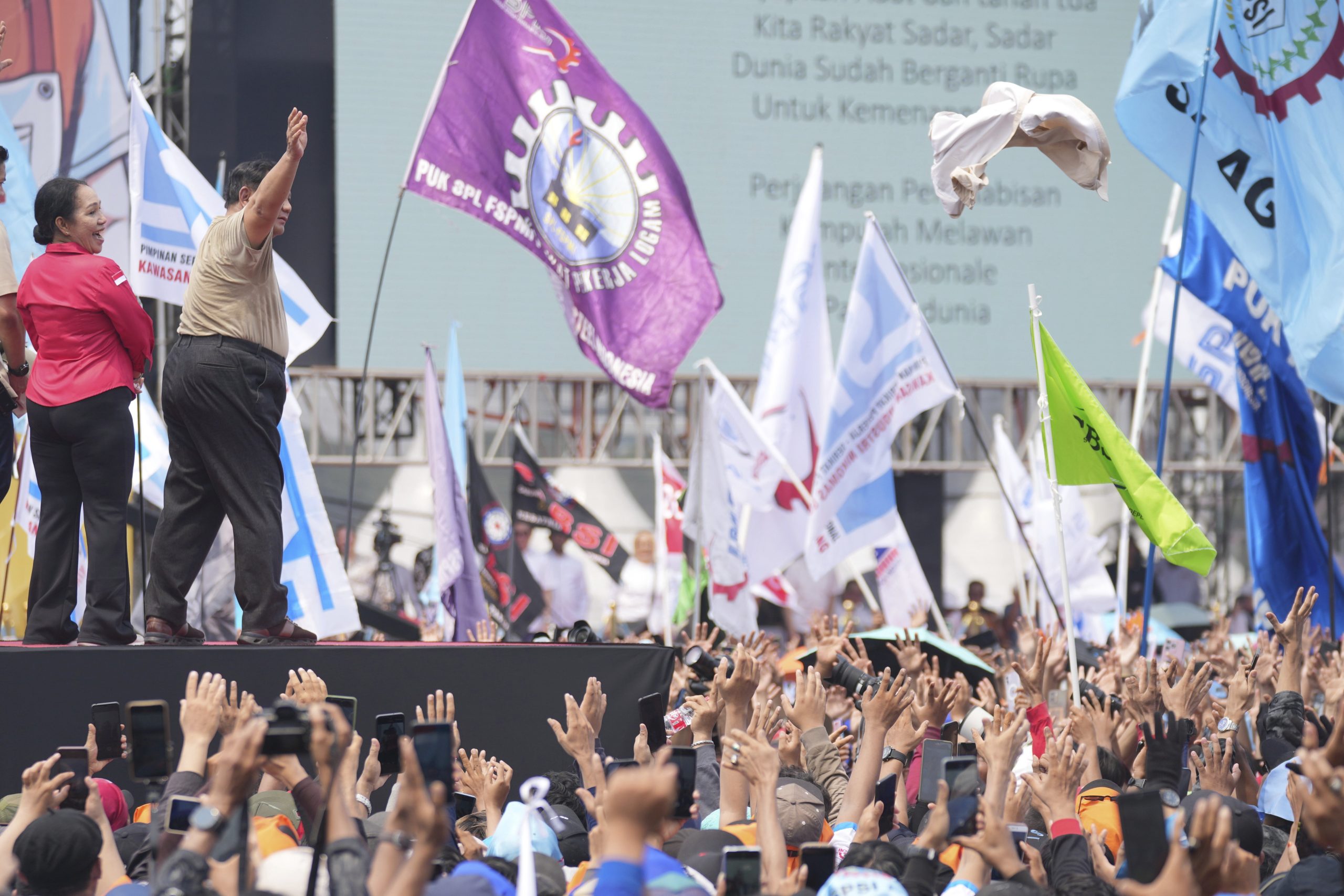 From Tokyo to Los Angeles, workers observe May Day as many express worries about Trump
