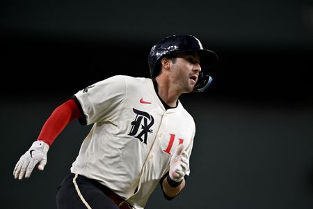 Rangers place C Kyle Higashioka on injured list