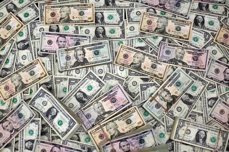 Dollar poised for third weekly gain as tariff concerns ease