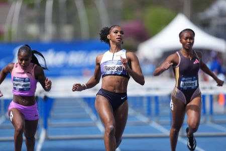 Athletics-Russell breaks American record in 100m hurdles at Grand Slam Track
