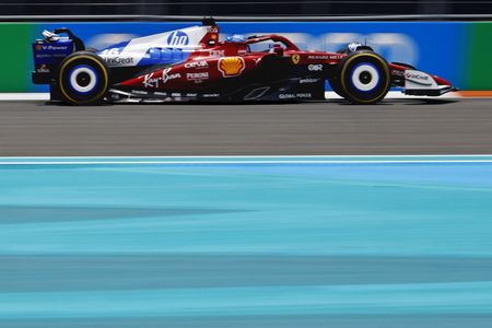 Motor racing-Disco helmets and blue Ferraris; F1 gets into Miami groove