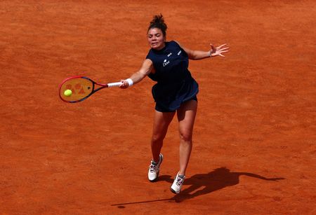 Tennis-Paolini battles past Shnaider at Italian Open, Alcaraz sets up Draper clash