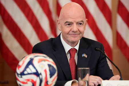 Soccer-US will welcome international fans for World Cup, says FIFA president