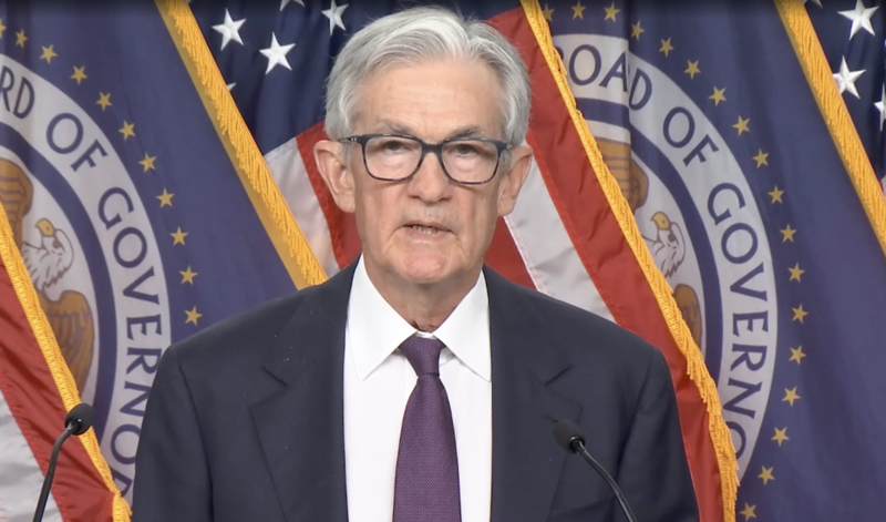 Powell warns of economic risks as Fed keeps rates steady