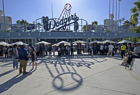 Immigrant rights activists call on LA Dodgers to speak out against ICE raids
