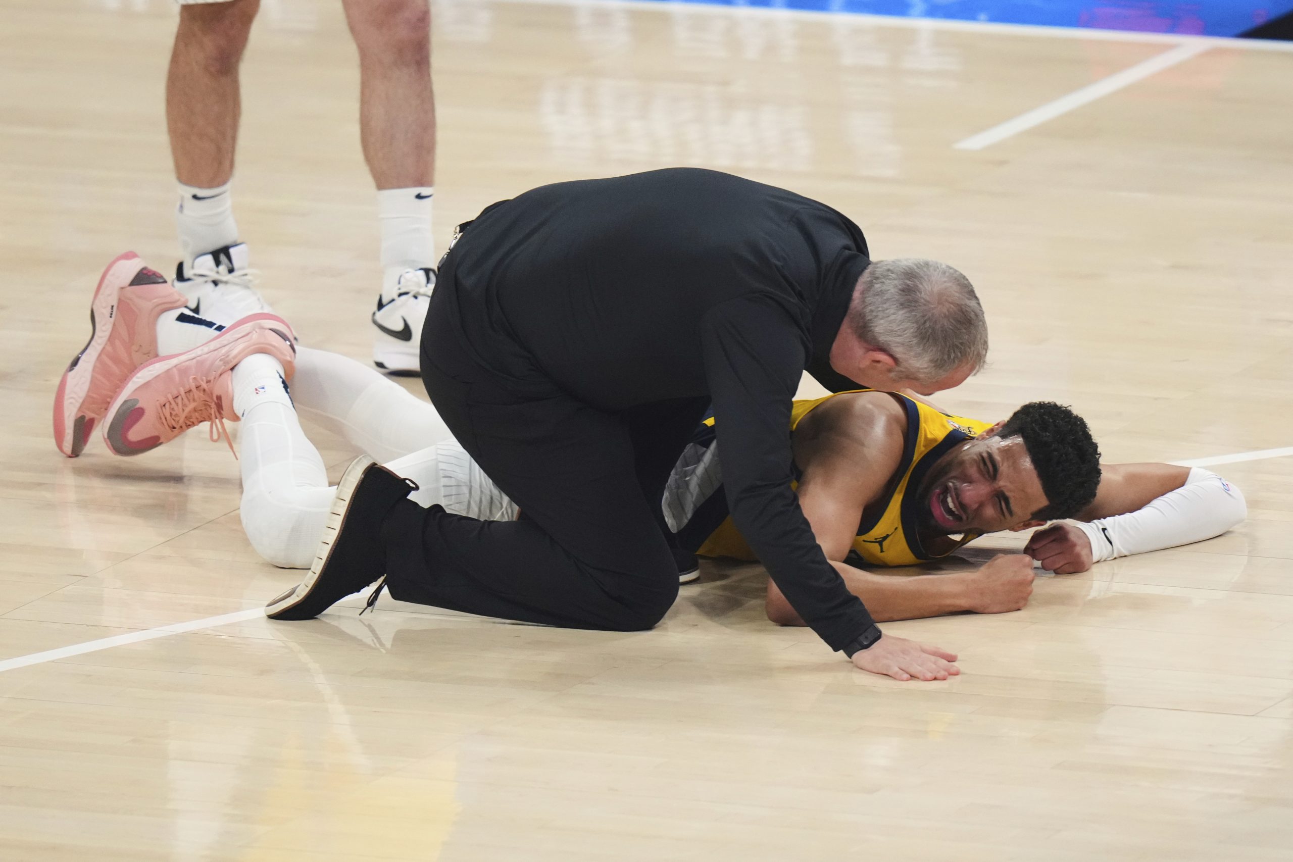 Pacers’ Tyrese Haliburton suffers right leg injury in NBA Finals. His father says it’s an Achilles